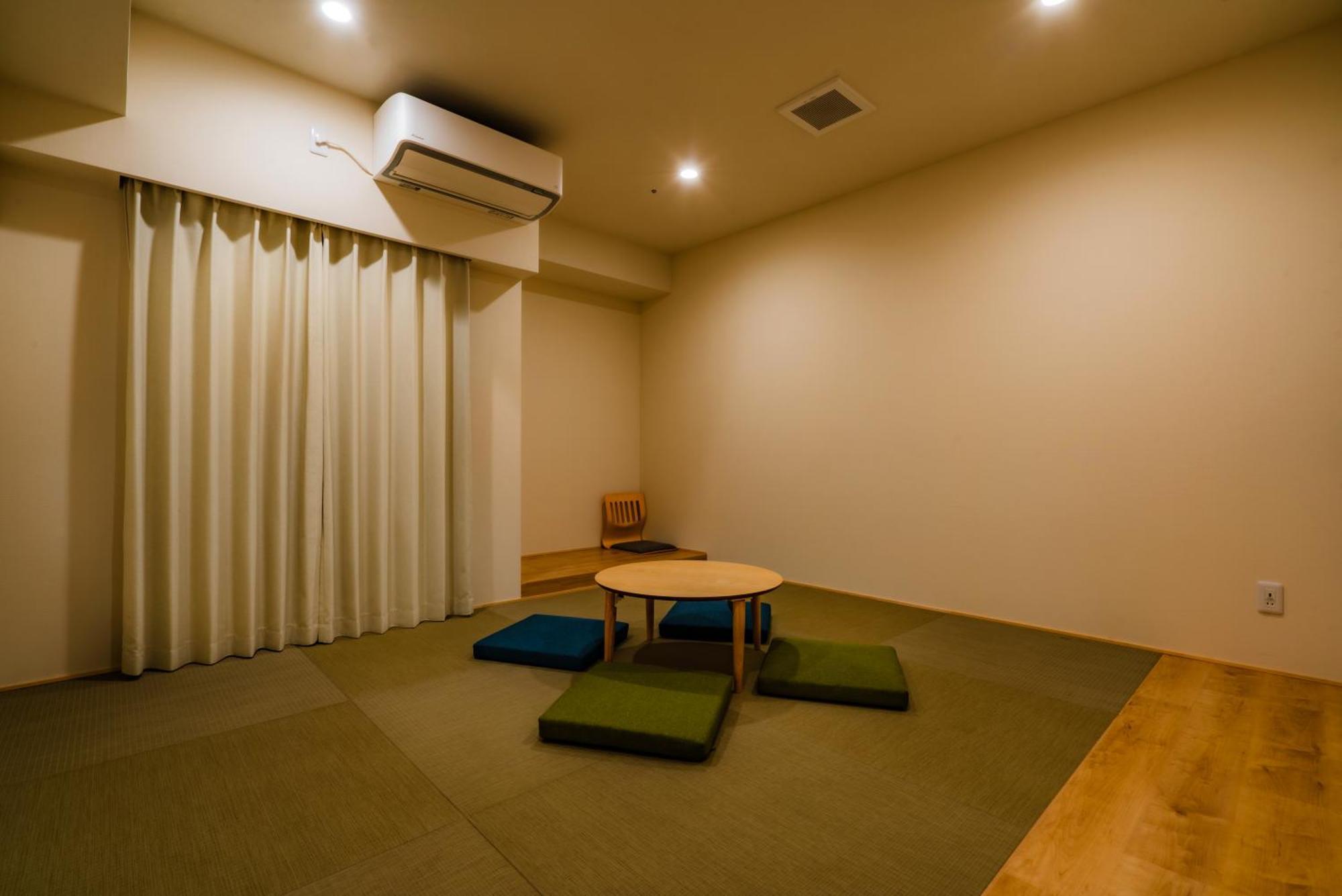 Randor Hotel Sapporo Suites חדר תמונה A room with a tatami floor