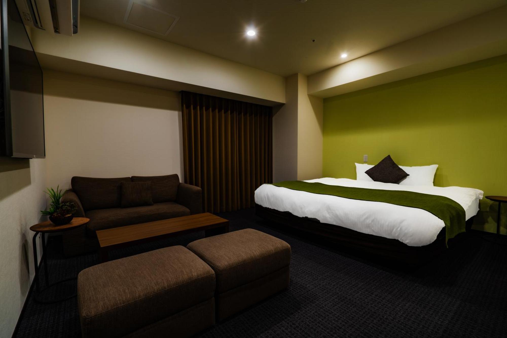 Randor Hotel Sapporo Suites חדר תמונה A room at the hotel