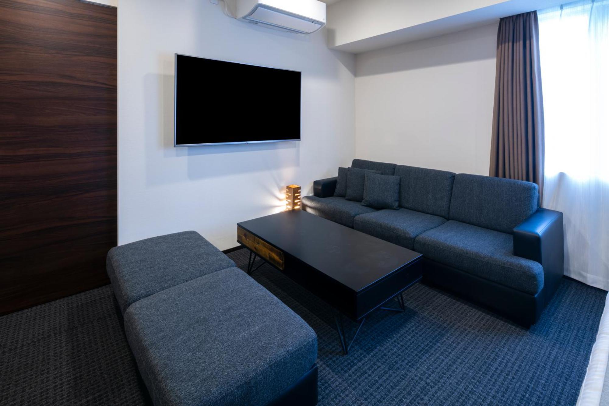 Randor Hotel Sapporo Suites חדר תמונה A typical room at a love hotel