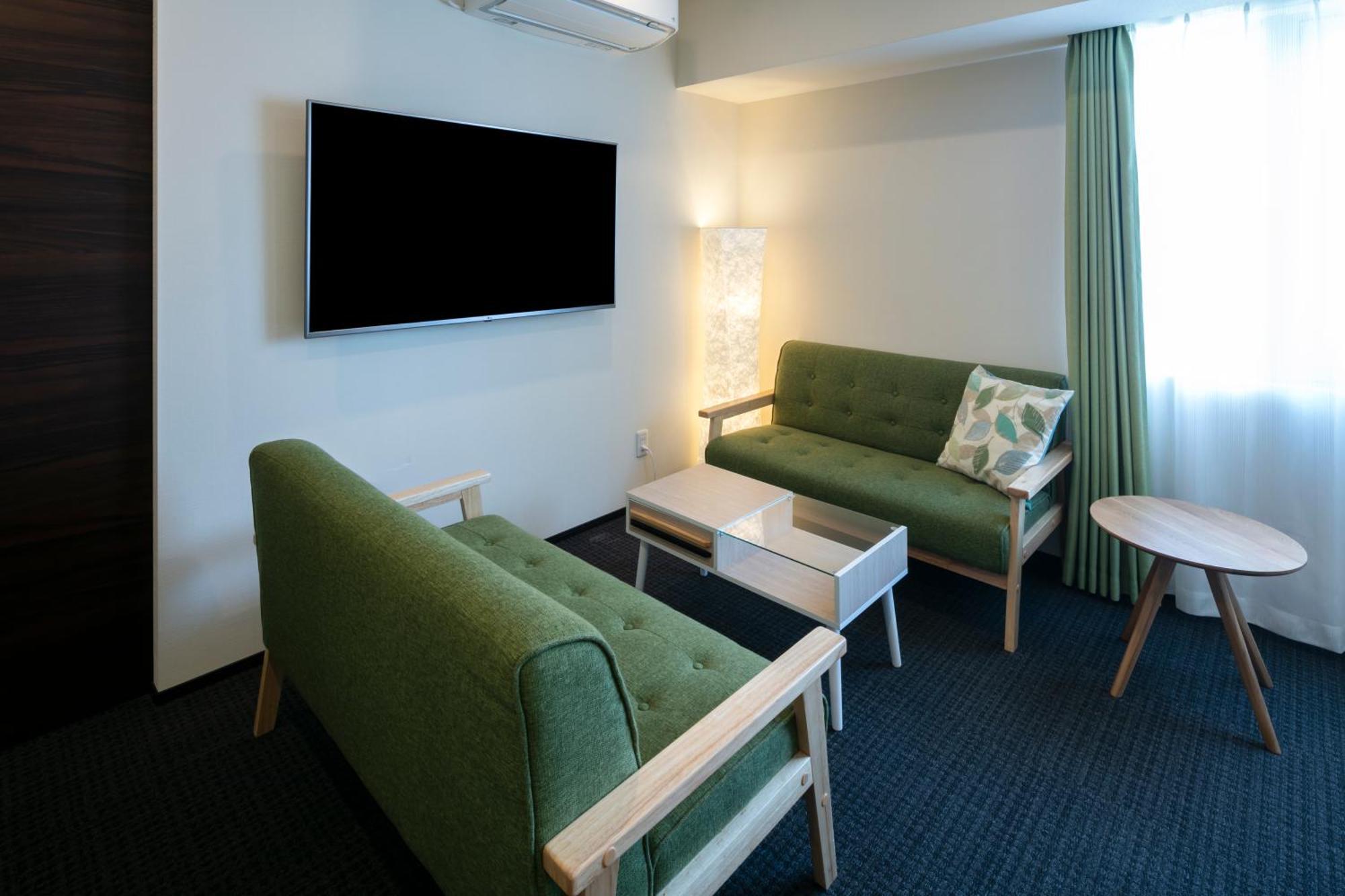 Randor Hotel Sapporo Suites חדר תמונה A room at the hotel