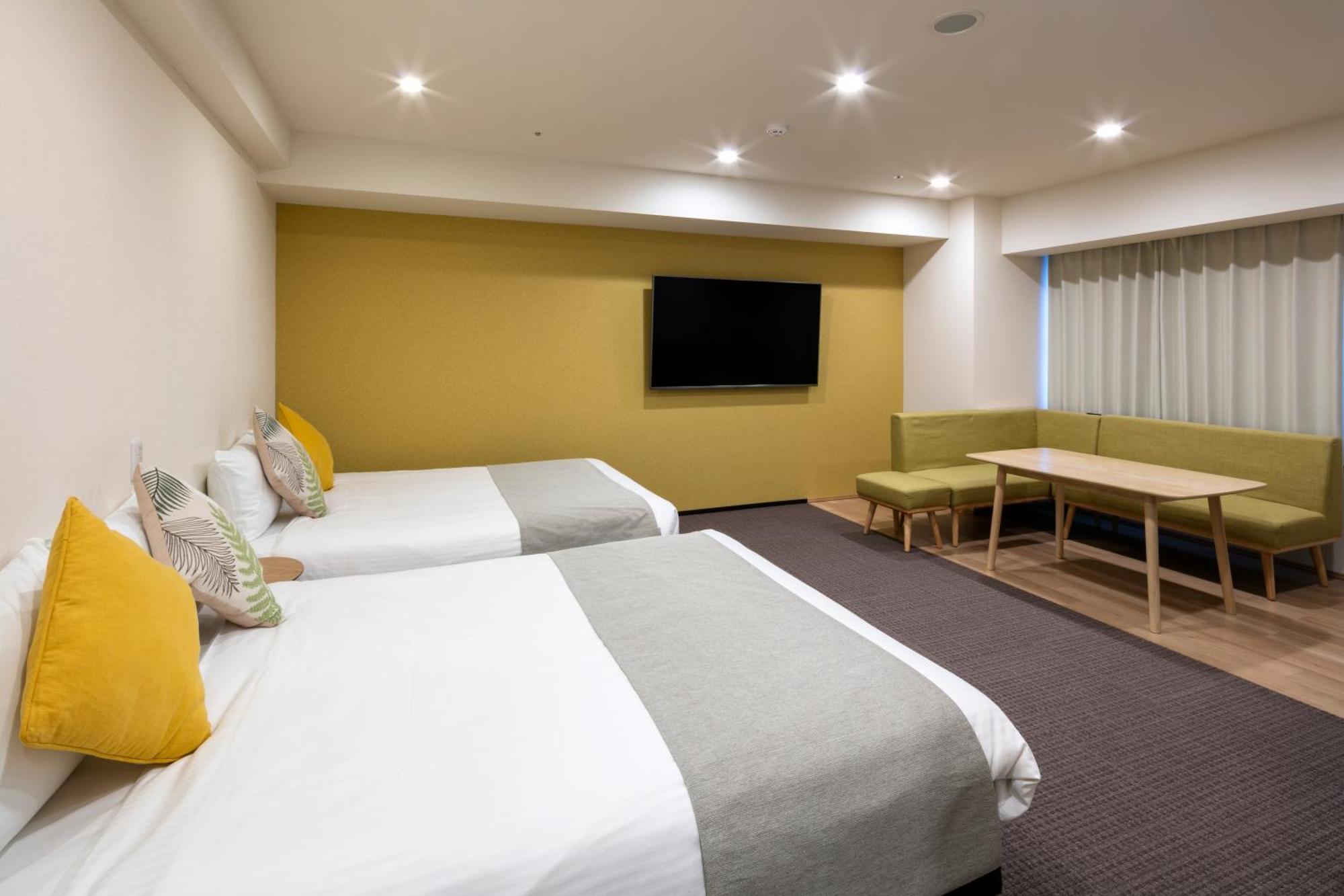 Randor Hotel Sapporo Suites חדר תמונה A room at the hotel