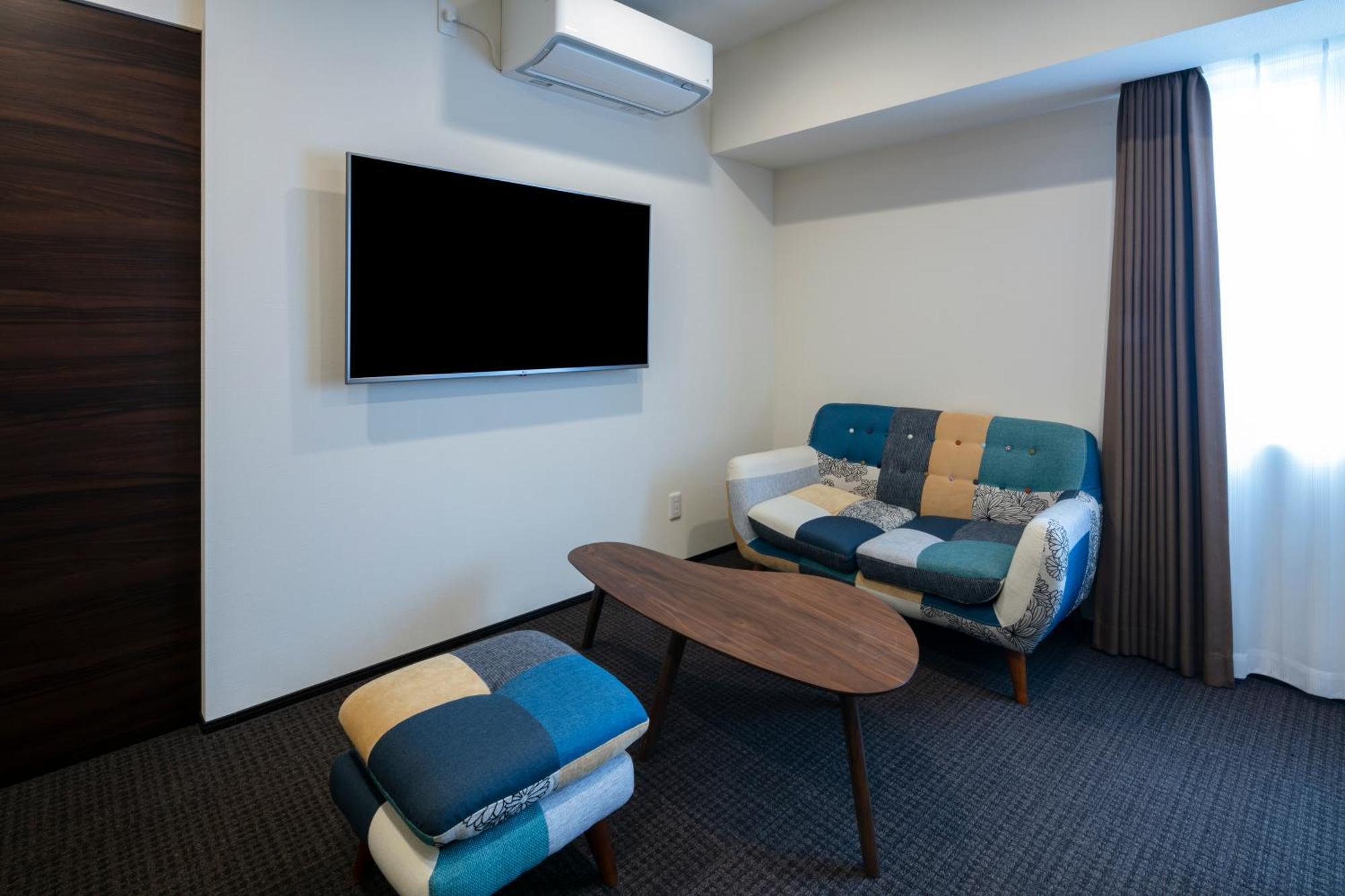 Randor Hotel Sapporo Suites חדר תמונה A room at the hotel