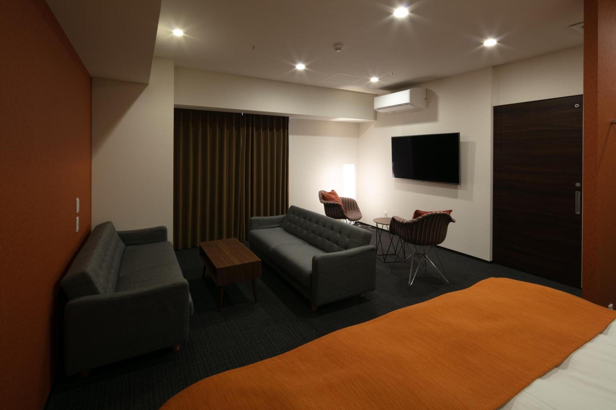 Randor Hotel Sapporo Suites חדר תמונה A room at the hotel