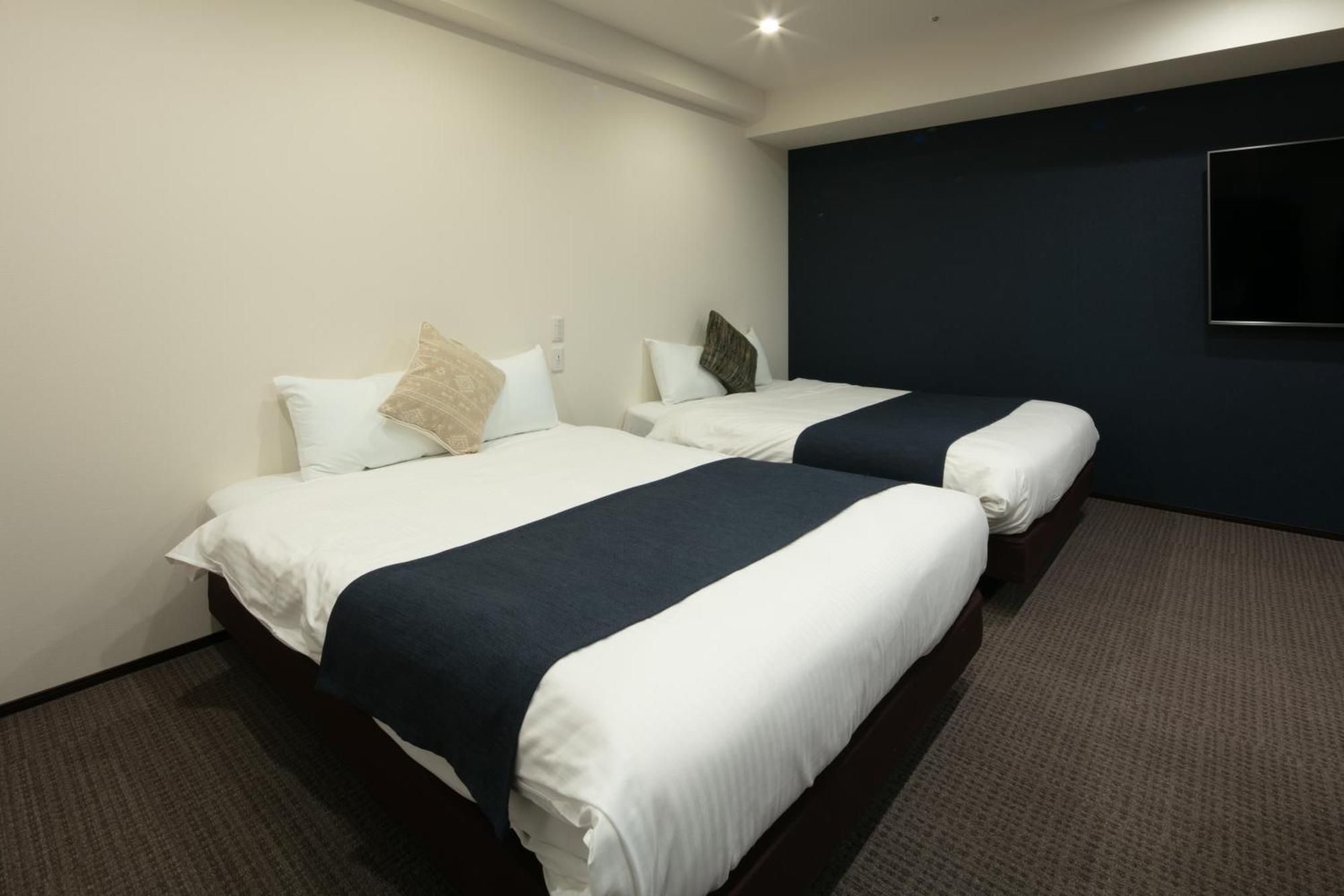 Randor Hotel Sapporo Suites חדר תמונה A room at the hotel